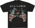 A black short-sleeve t-shirt with a graphic print of the band Disturbed. The design features the band&
